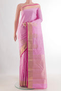 Pure Silk Pink Kanjivaram Saree with Zari Butta on the body and Zari Border.  displayed on a mannequin