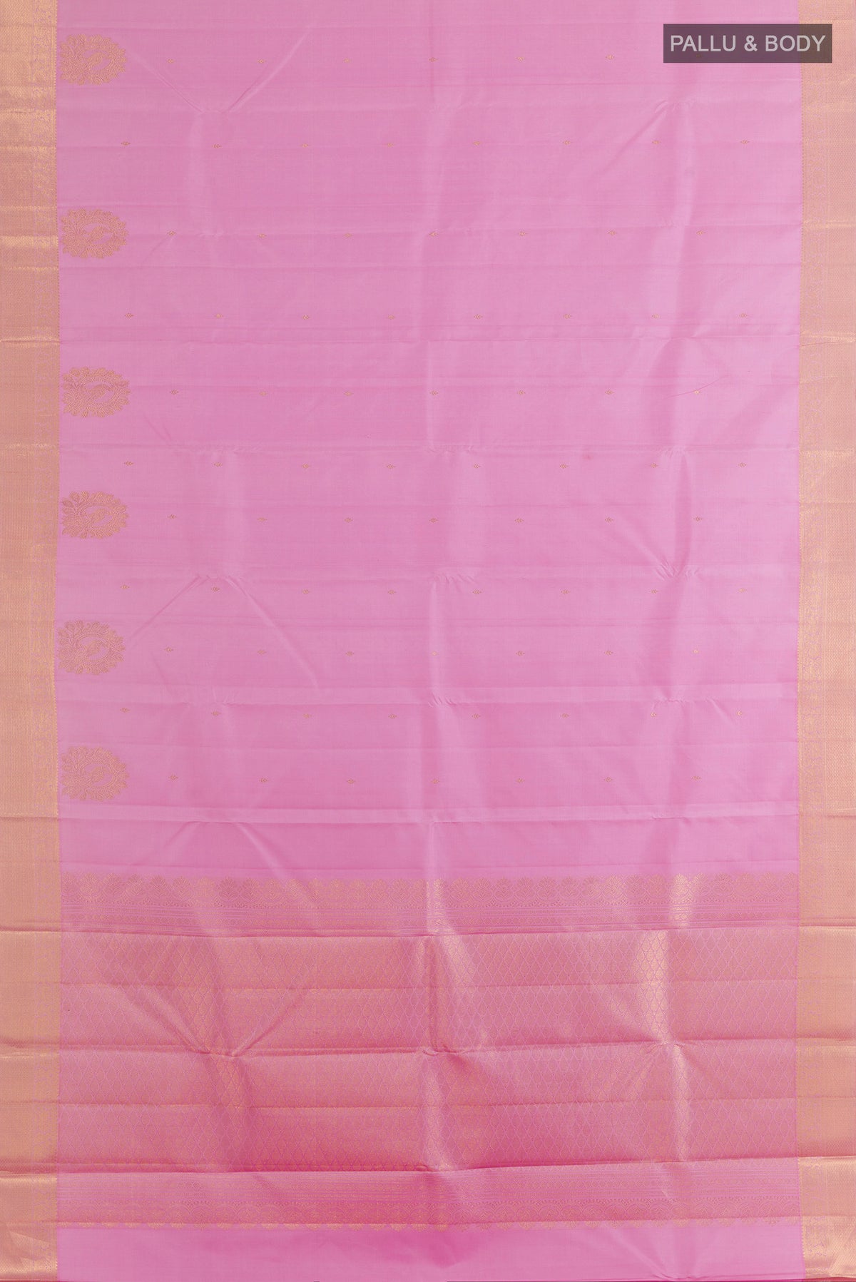 Flat view of Pure Silk Pink Kanjivaram Saree with Zari Butta on the body and Zari Border. 