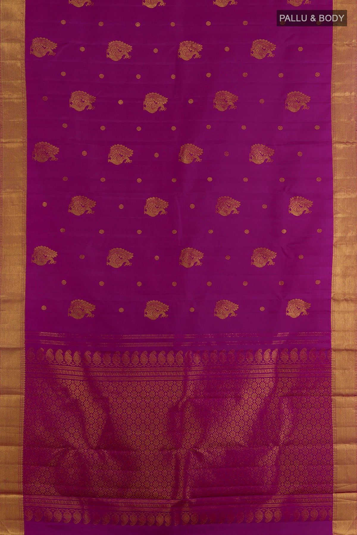 Flat view of Pure Silk Magenta Kanjivaram Saree with Zari Butta on the body and Zari Border. 
