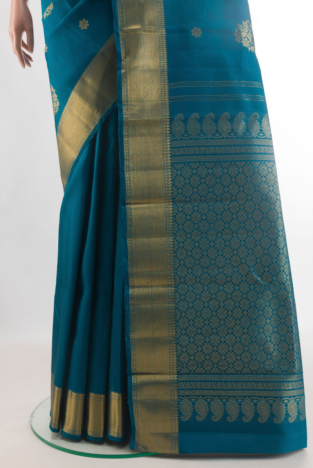 Pleats and pallu of Pure Silk Blue Kanjivaram Saree with Zari Butta on the body and Zari Border. 