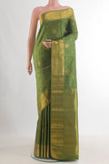 Pure Silk Mehandi Green Kanjivaram Saree with Zari Butta on the body and Zari Border.  displayed on a mannequin