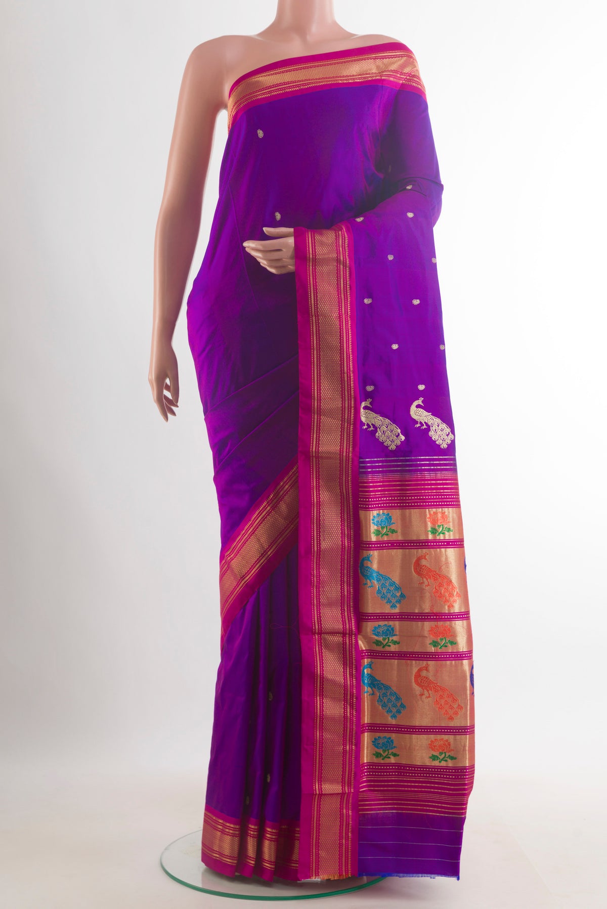 Pure Silk Purple Paithani Saree with Zari Butta on the body and Zari Border.  displayed on a mannequin