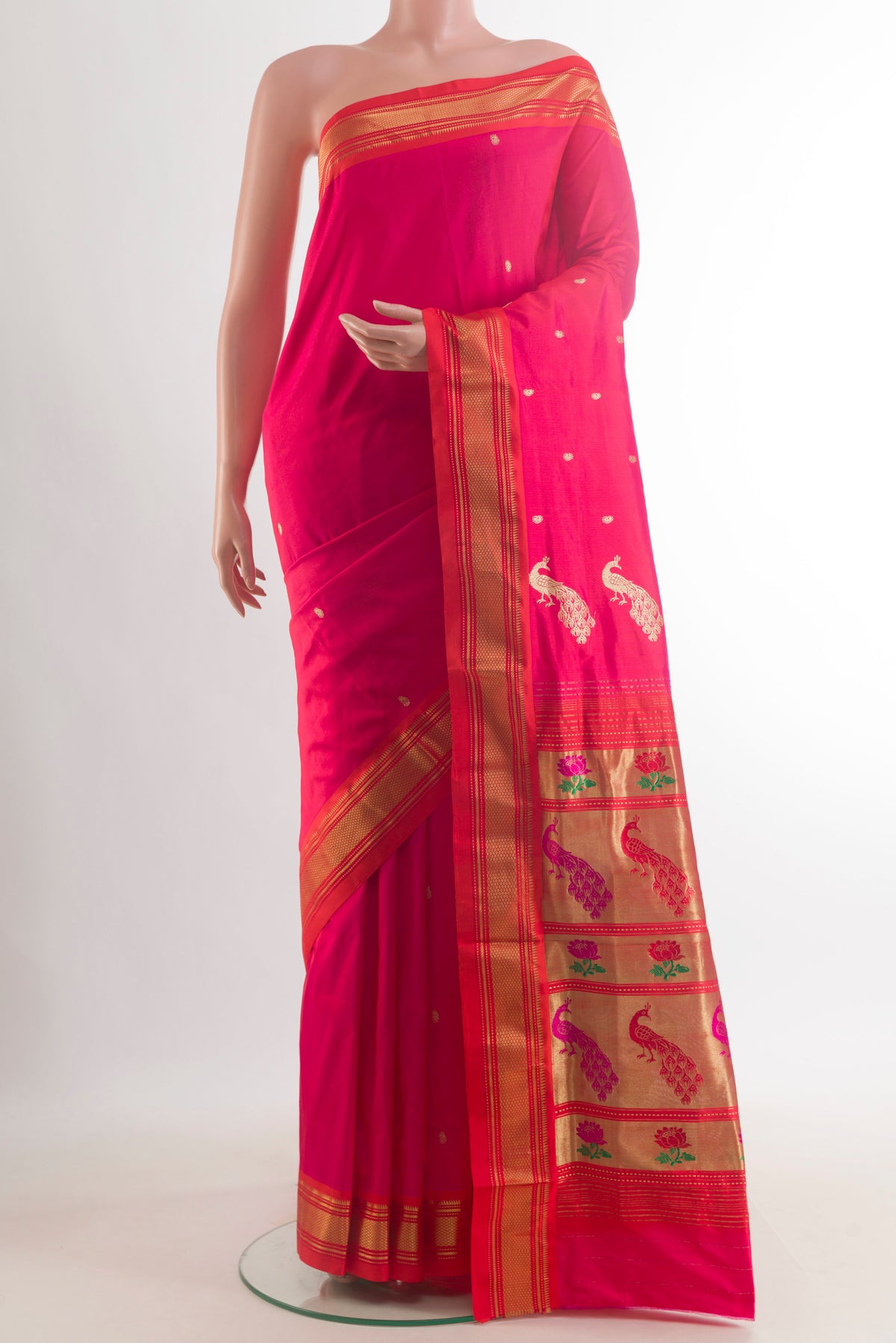 Pure Silk Pink Paithani Saree with Zari Butta on the body and Zari Border.  displayed on a mannequin