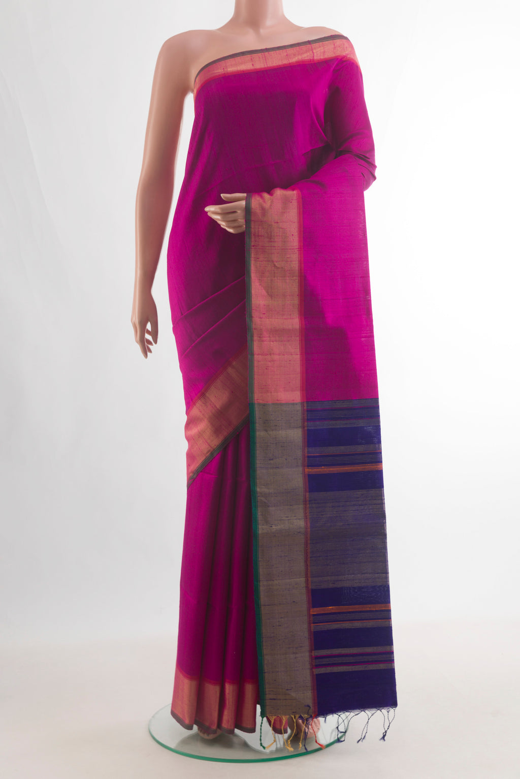 Pure Silk Dark Pink Raw Saree with Plain Body and Zari Border.  displayed on a mannequin