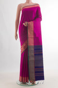 Pure Silk Dark Pink Raw Saree with Plain Body and Zari Border.  displayed on a mannequin