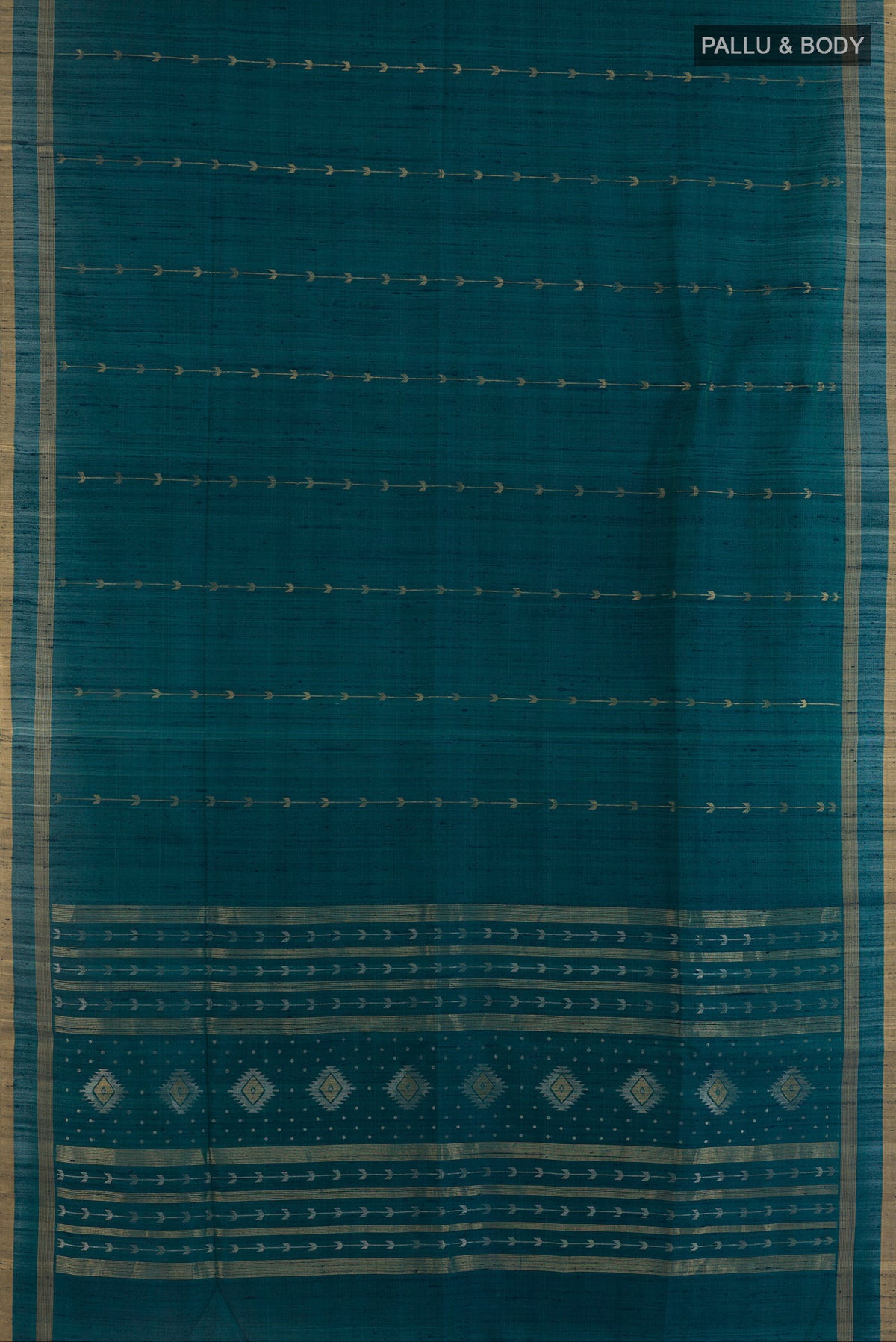 Flat view of Pure Silk Teal Raw Saree with Zari Butta on the body and Zari Border. 