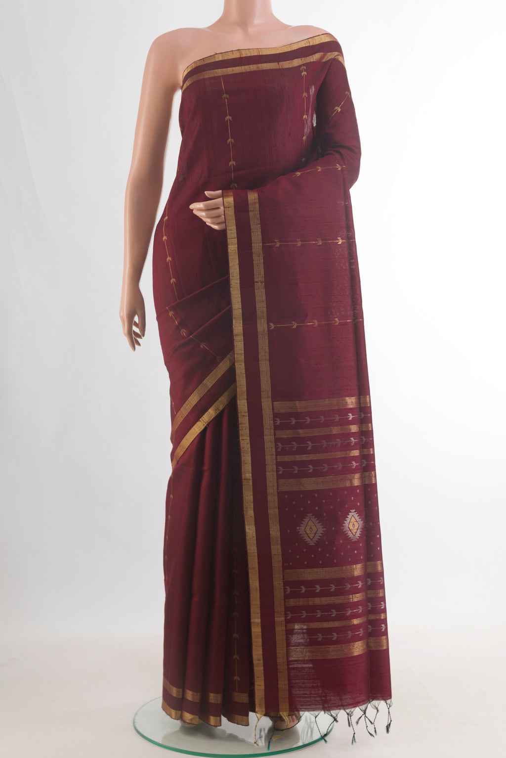 Pure Silk Brown Raw Saree with Stripes on the body and Zari Border.  displayed on a mannequin