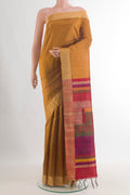 Pure Silk Mustard Raw Saree with Plain Body and Zari Border.  displayed on a mannequin