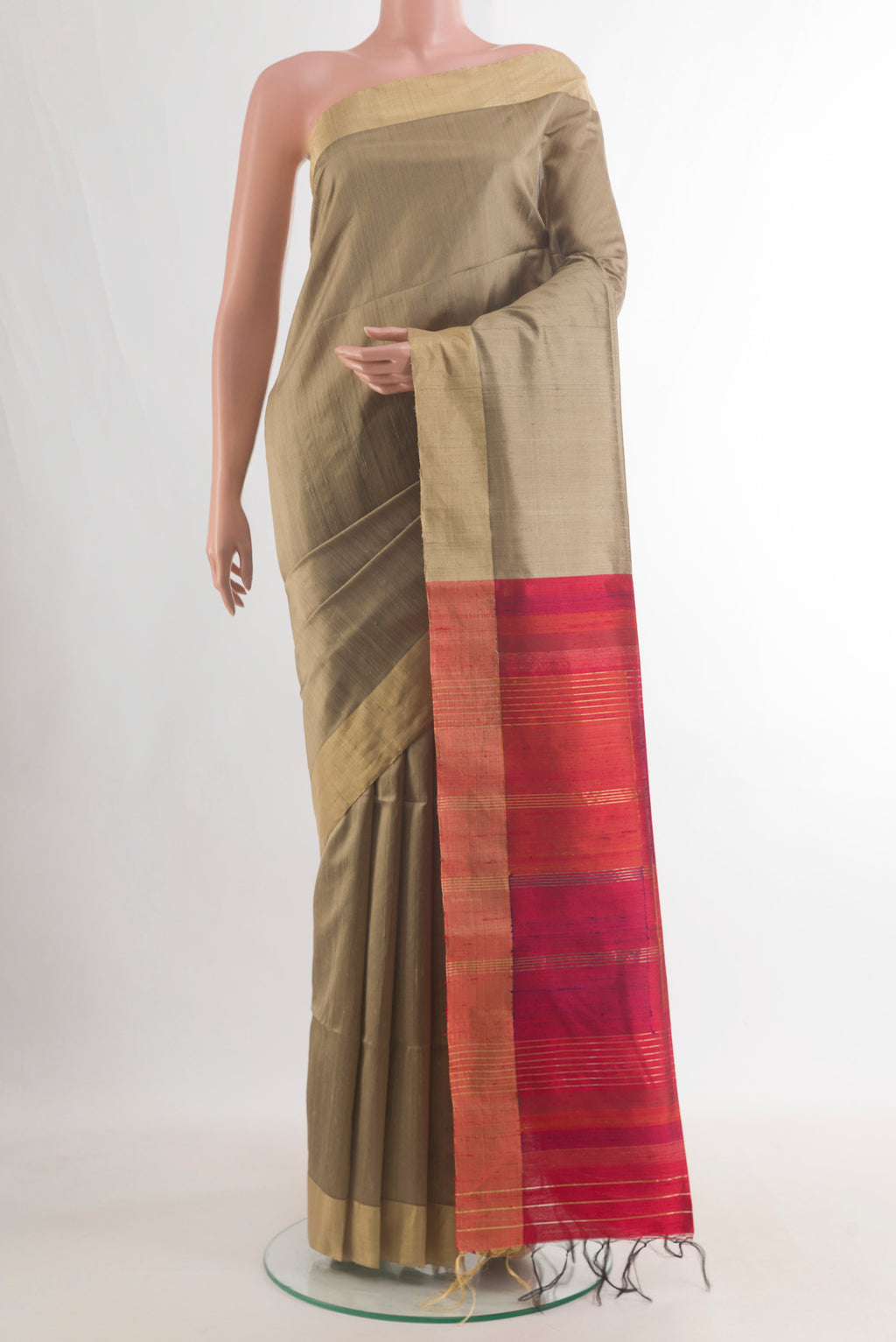 Pure Silk Beige Raw Saree with Plain Body and Zari Border.  displayed on a mannequin