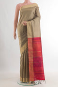 Pure Silk Beige Raw Saree with Plain Body and Zari Border.  displayed on a mannequin