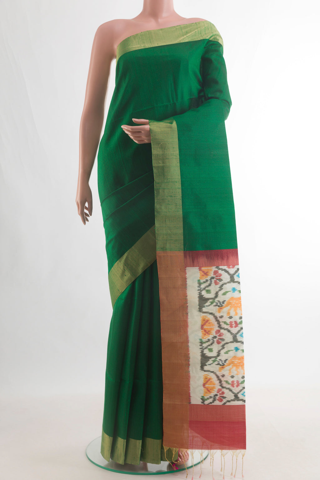 Pure Silk Green Raw Saree with Plain Body and Zari Border.  displayed on a mannequin