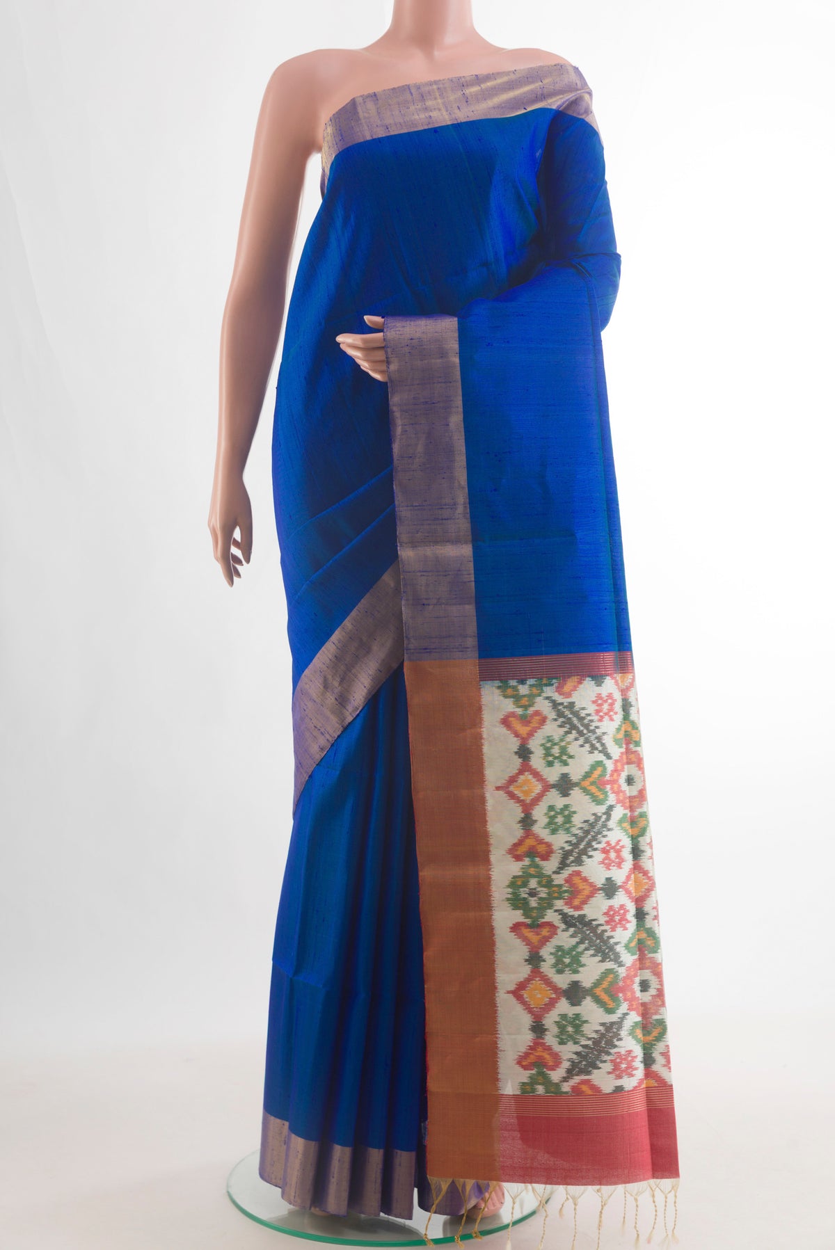 Pure Silk Blue Raw Saree with Plain Body and Zari Border.  displayed on a mannequin