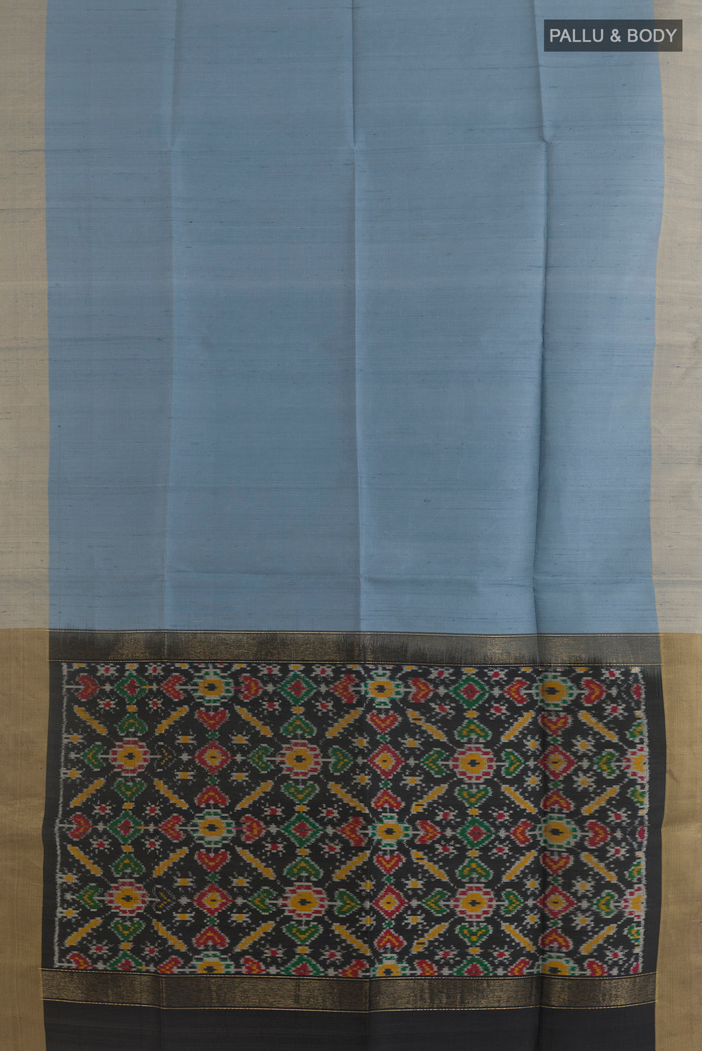 Flat view of Pure Silk Grey Raw Saree with Plain Body and Zari Border. 