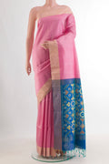 Pure Silk Pink Raw Saree with Plain Body and Zari Border.  displayed on a mannequin