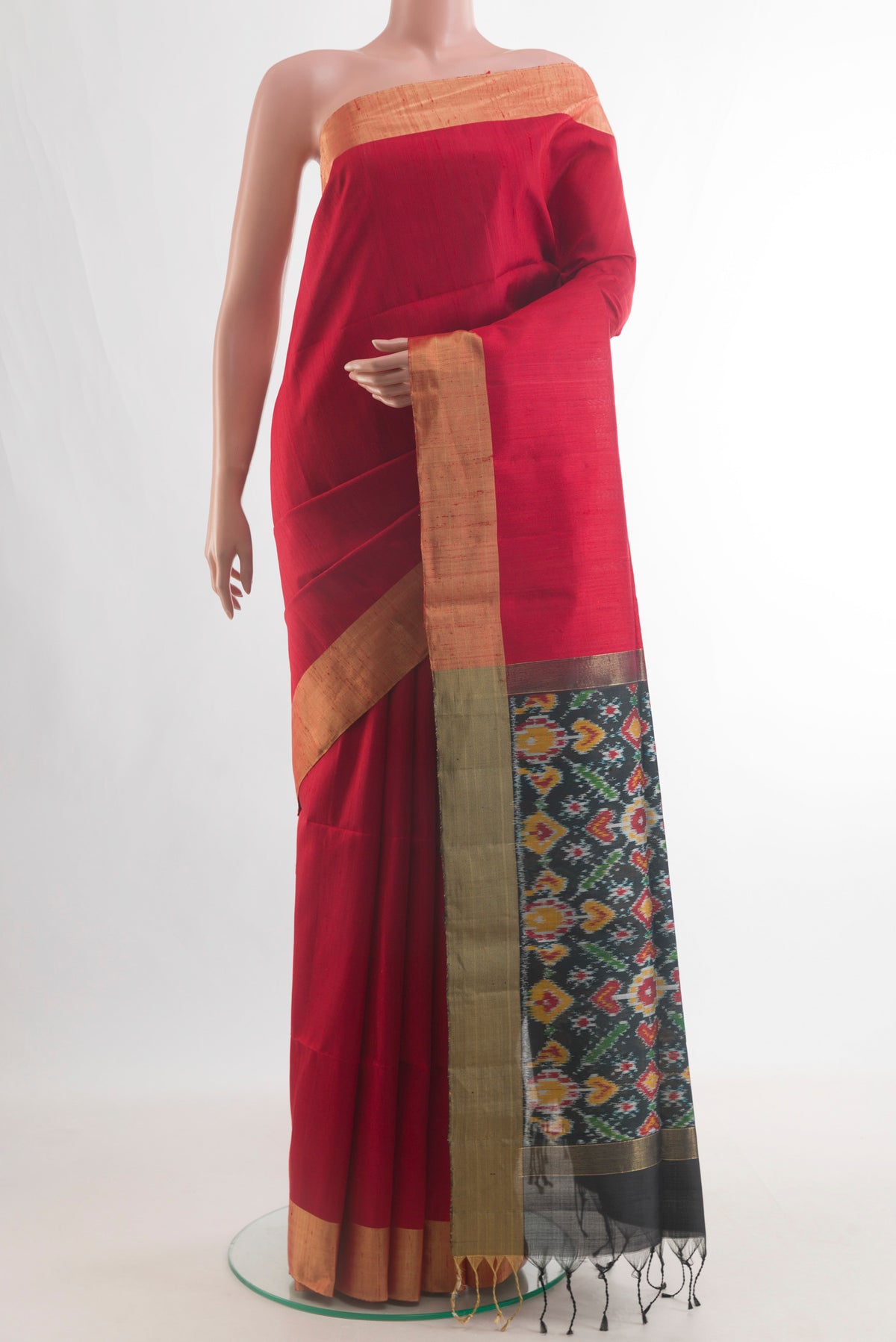 Pure Silk Red Raw Saree with Zari Butta on the body and Zari Border.  displayed on a mannequin