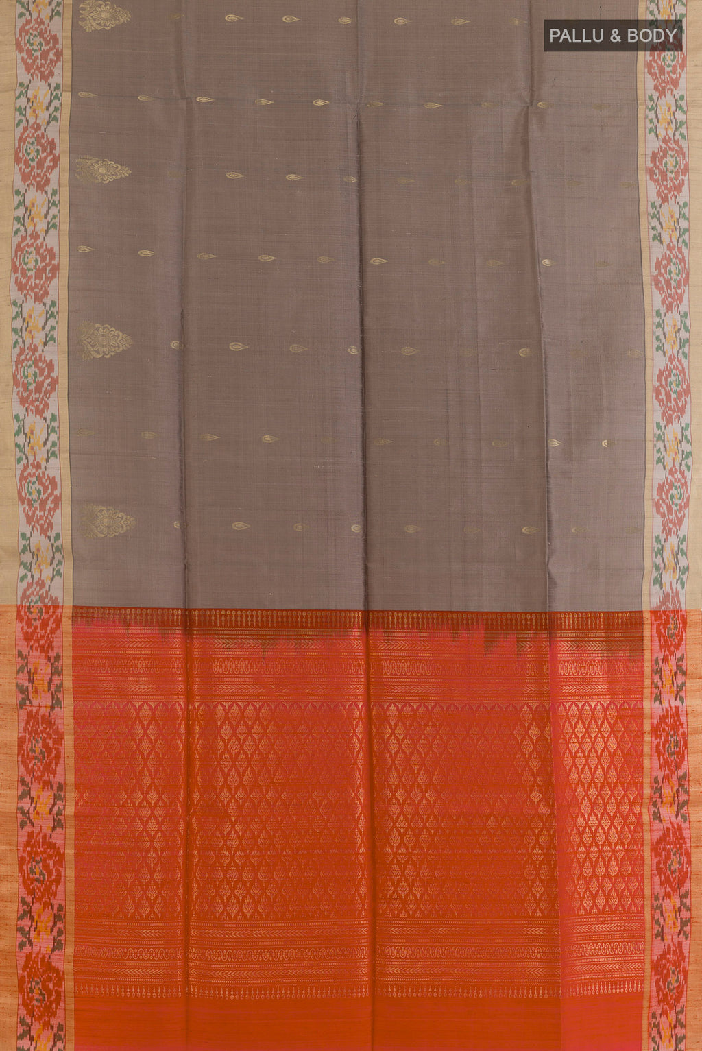 Flat view of Pure Silk Grey Raw Saree with Zari Butta on the body and Ikat Border. 
