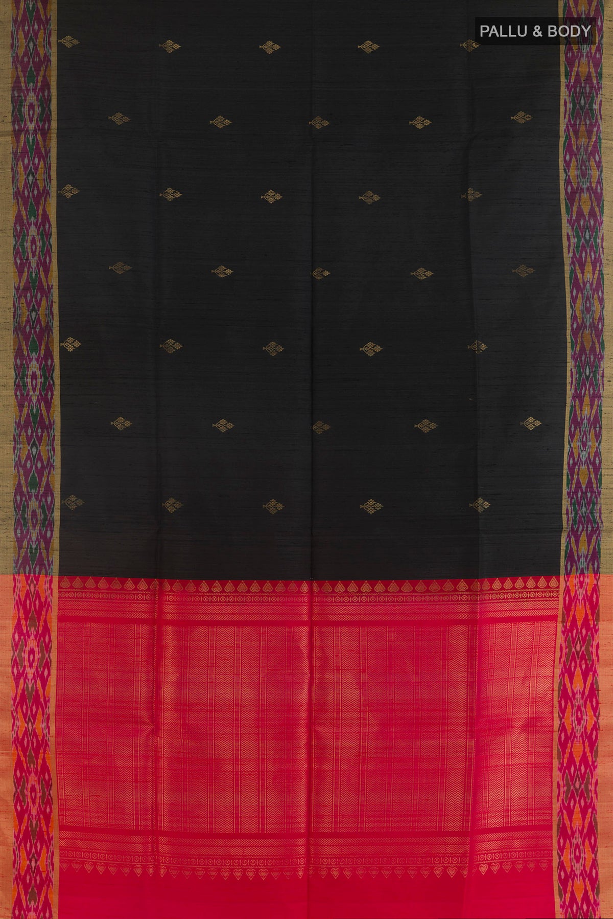 Flat view of Pure Silk Black Raw Saree with Zari Butta on the body and Ikat Border. 