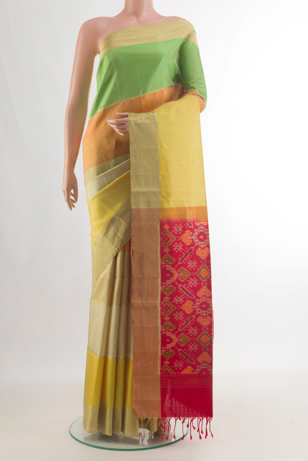 Pure Silk Multi Color Soft Saree with Checked design on the body and Zari Border.  displayed on a mannequin