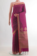 Pure Silk Magenta Soft Saree with Stripes on the body and Zari Border.  displayed on a mannequin