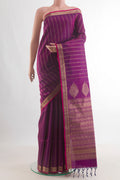 Pure Silk Magenta Soft Saree with Stripes on the body and Zari Border.  displayed on a mannequin