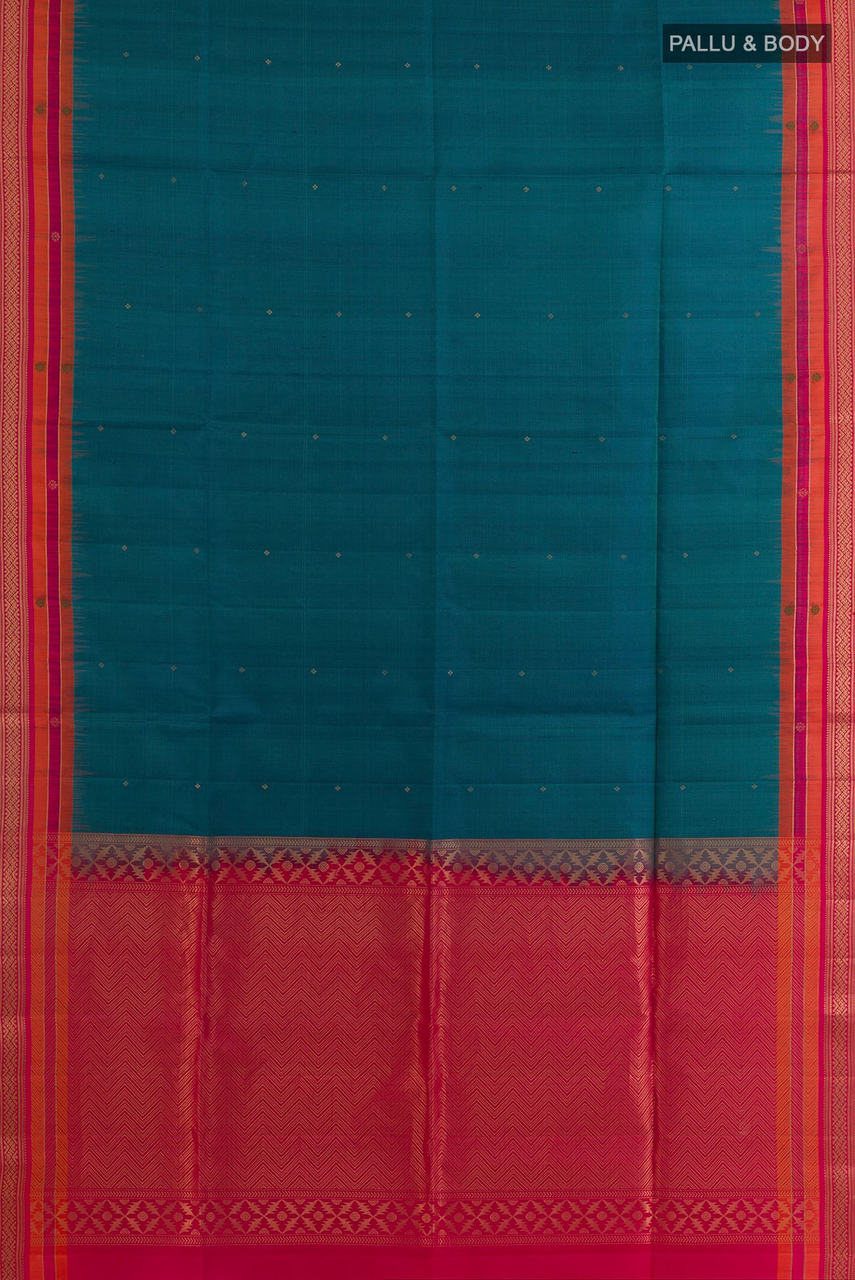 Flat view of Pure Silk Peacock Blue Soft Saree with Zari Butta on the body and Zari Border. 