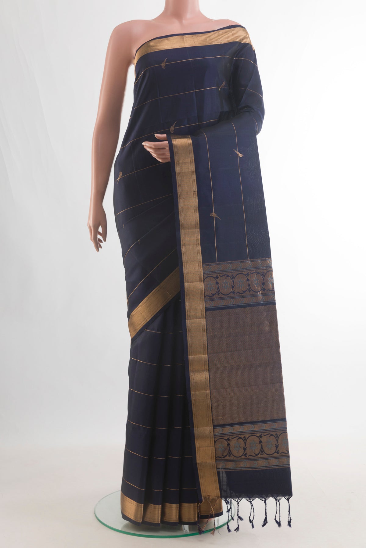 Pure Silk Navy Blue Soft Saree with Stripes on the body and Zari Border.  displayed on a mannequin
