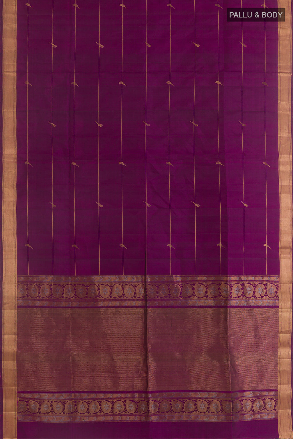 Flat view of Pure Silk Purple Soft Saree with Stripes on the body and Zari Border. 