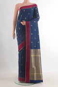 Pure Silk Navy Blue Soft Saree with Zari Butta on the body and Zari Border.  displayed on a mannequin