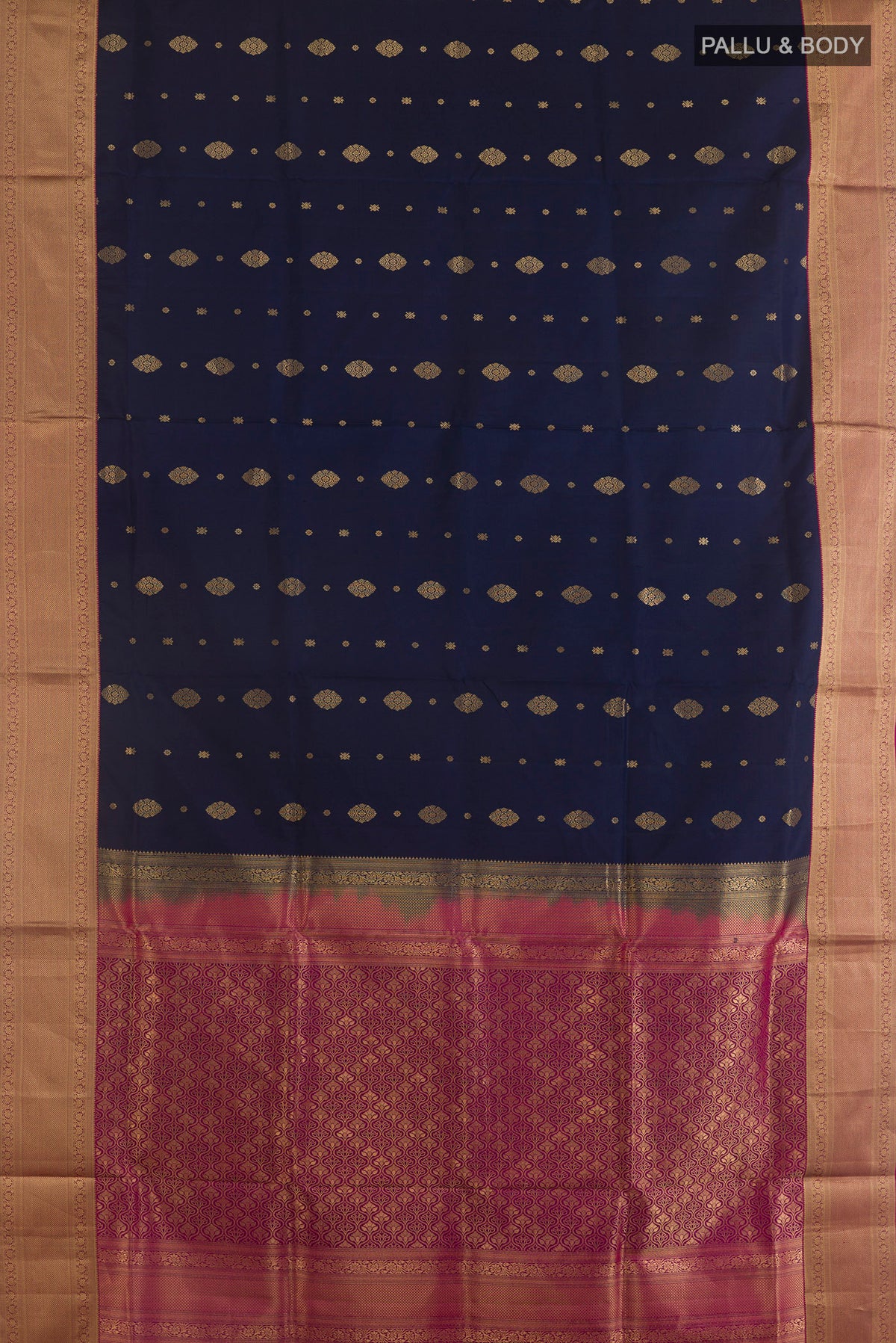 Flat view of Pure Silk Navy Blue Soft Saree with Zari Butta on the body and Zari Border. 