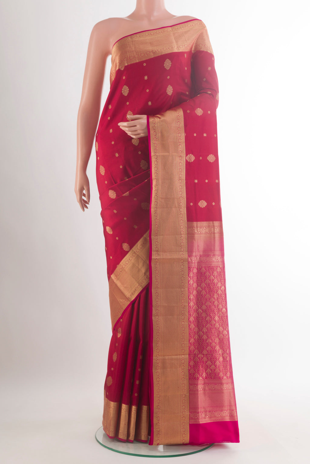 Pure Silk Red Soft Saree with Zari Butta on the body and Zari Border.  displayed on a mannequin