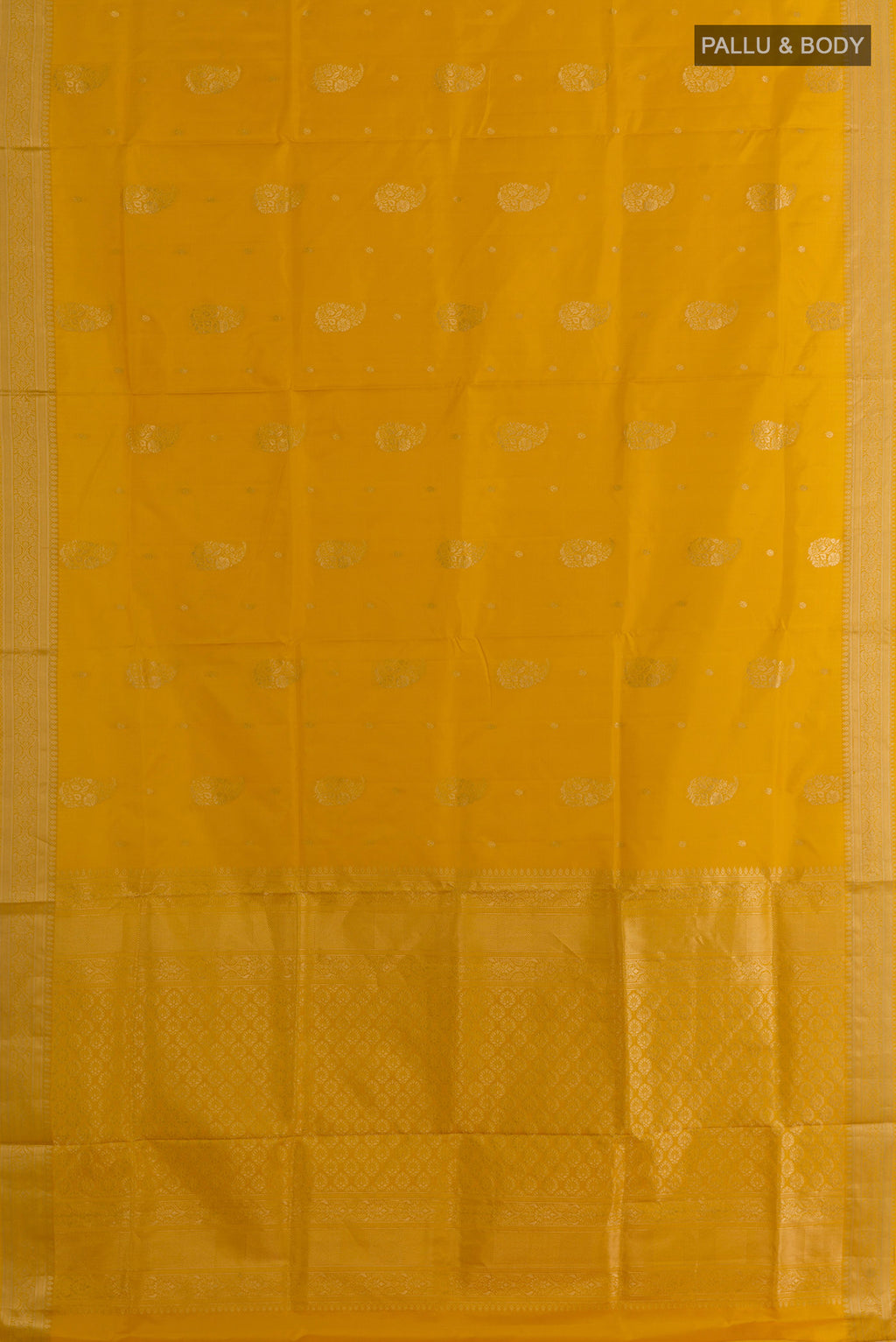 Flat view of Pure Silk Yellow Soft Saree with Zari Butta on the body and Zari Border. 