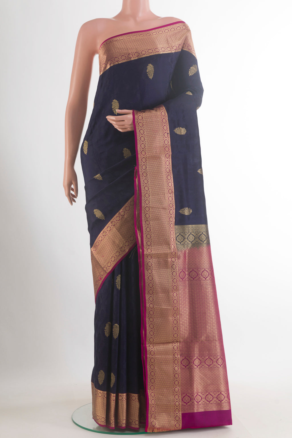 Pure Silk Navy Blue Soft Saree with Jacquard With Zari Butta on the body and Zari Border.  displayed on a mannequin
