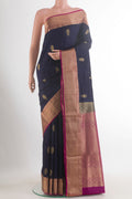 Pure Silk Navy Blue Soft Saree with Jacquard With Zari Butta on the body and Zari Border.  displayed on a mannequin