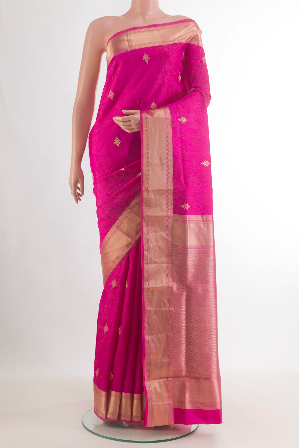 Pure Silk Pink Soft Saree with Jacquard With Zari Butta on the body and Zari Border.  displayed on a mannequin
