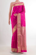 Pure Silk Pink Soft Saree with Jacquard With Zari Butta on the body and Zari Border.  displayed on a mannequin