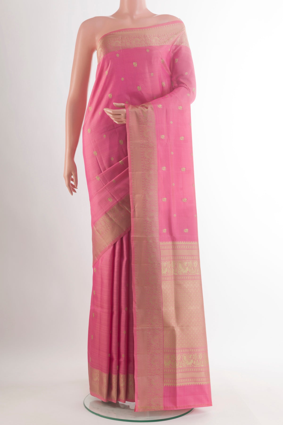 Pure Silk Pink Soft Saree with Thread Butta on the body and Thread Border.  displayed on a mannequin