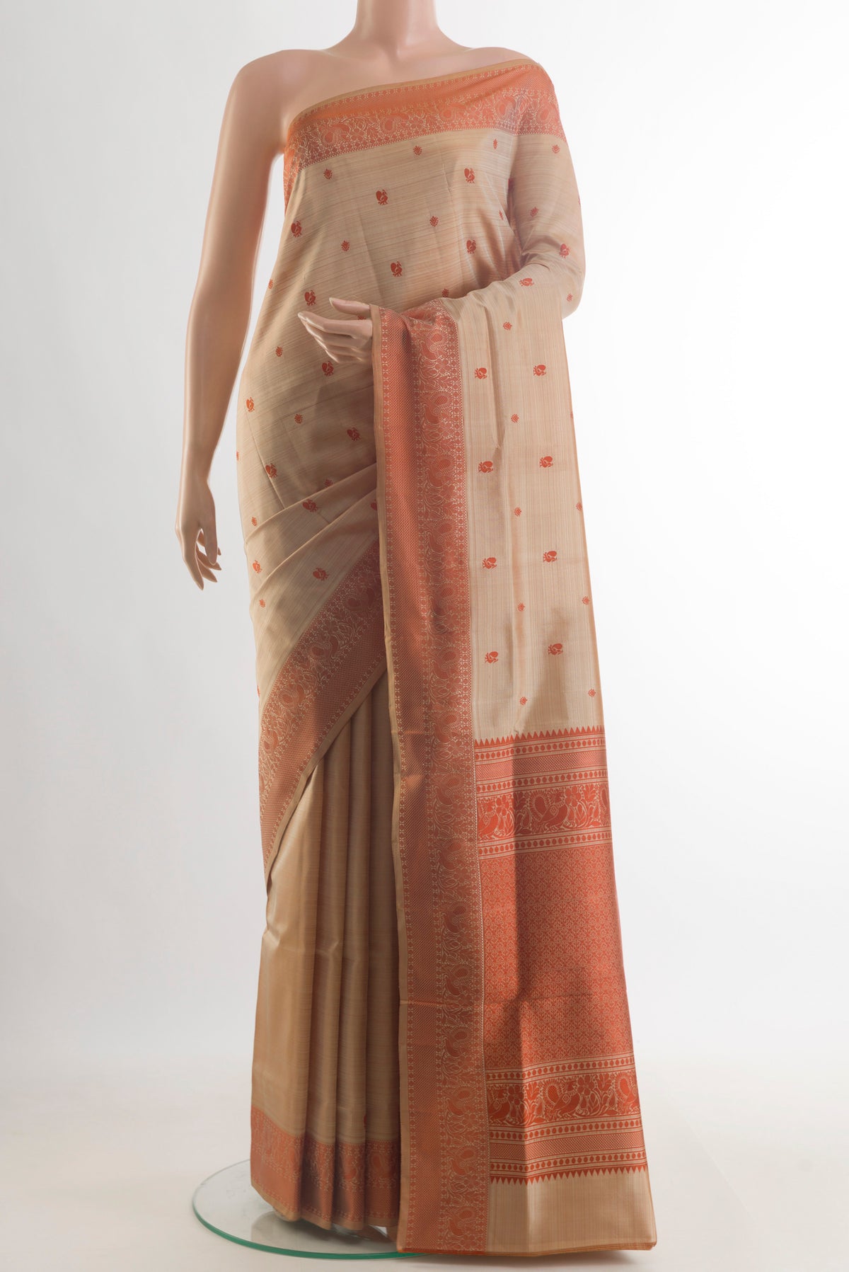 Pure Silk Beige Soft Saree with Thread Butta on the body and Thread Border.  displayed on a mannequin