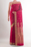 Pure Silk Red Soft Saree with Zari Butta on the body and Zari Border.  displayed on a mannequin