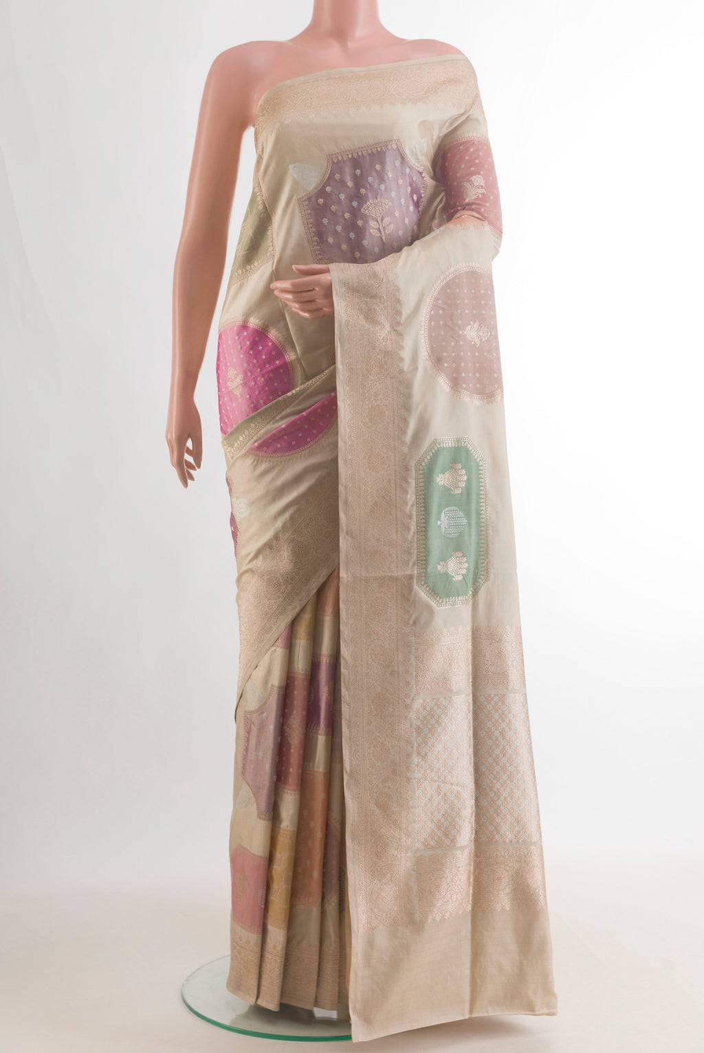 Pure Silk Multi Color Banarasi Saree with Zari Brocade on the body and Zari Border.  displayed on a mannequin