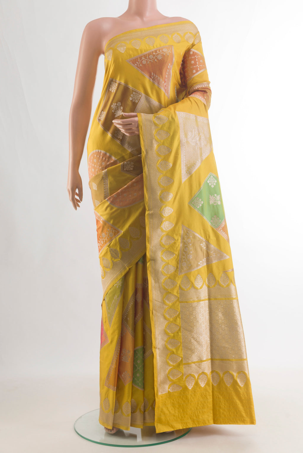 Pure Silk Mustard Banarasi Saree with Fancy on the body and Zari Border.  displayed on a mannequin
