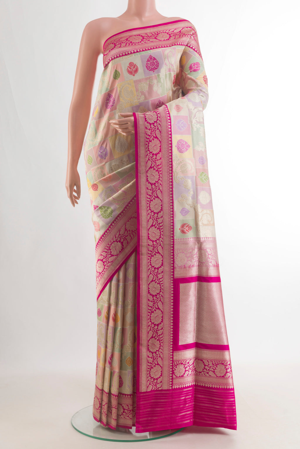 Pure Silk Multi Color Banarasi Saree with Zari Brocade on the body and Zari Border.  displayed on a mannequin
