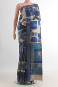 Blue Tussar Saree with Printed design on the body and Zari Border.  displayed on a mannequin