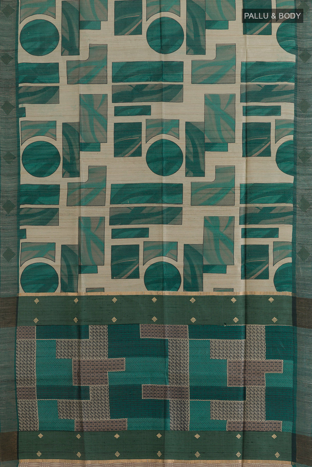 Flat view of Green Tussar Saree with Printed design on the body and Zari Border. 
