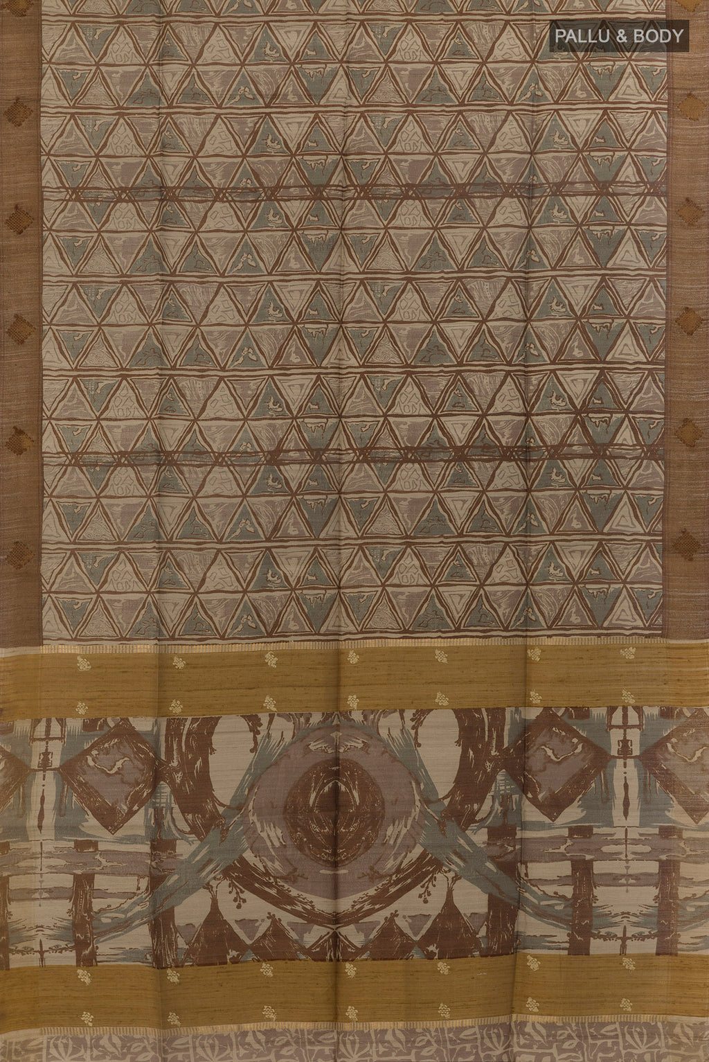 Flat view of Beige Tussar Saree with Printed design on the body and Zari Border. 