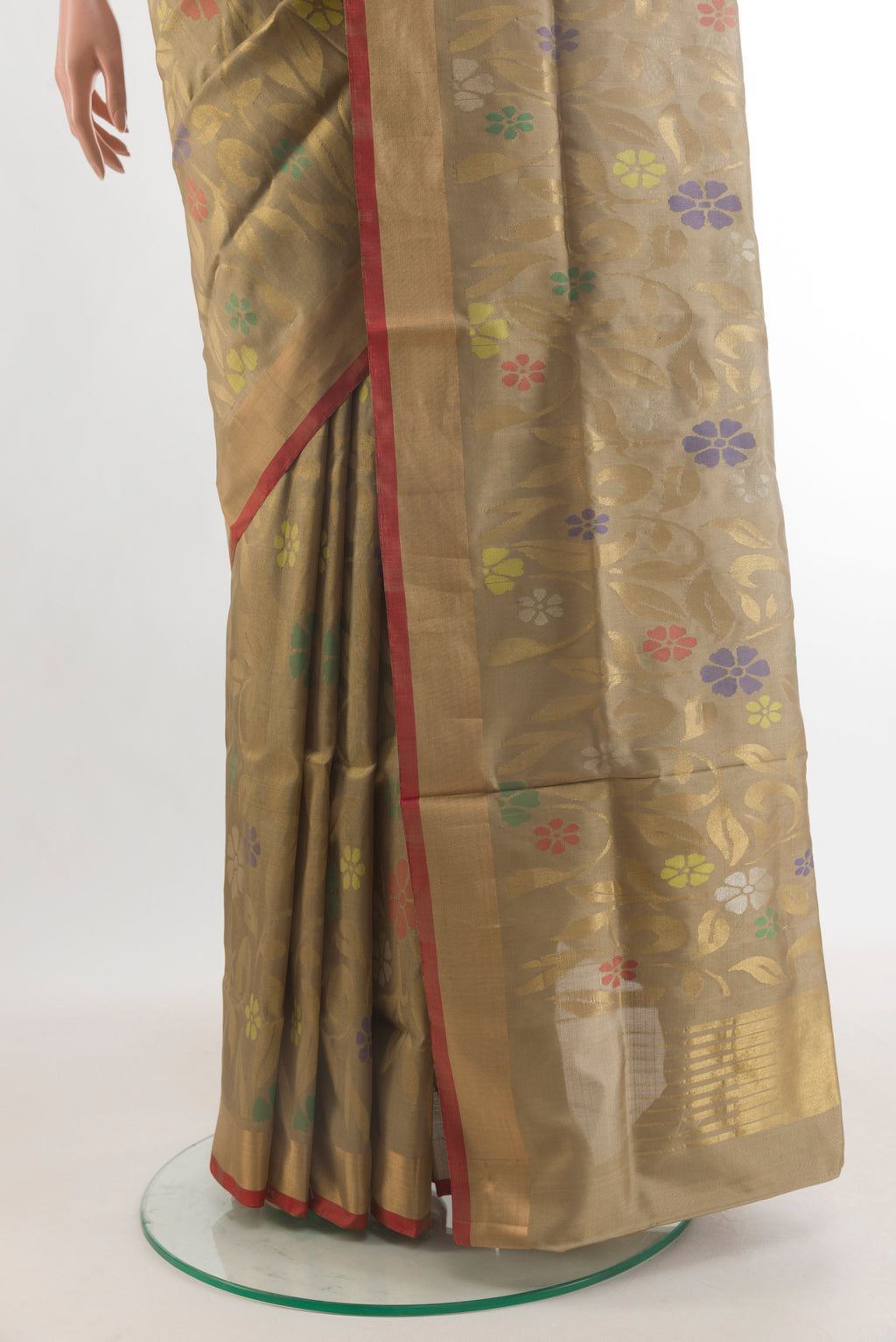 Pleats and pallu of Pure Silk Beige Uppada Saree with Zari Brocade on the body and Zari Border. 