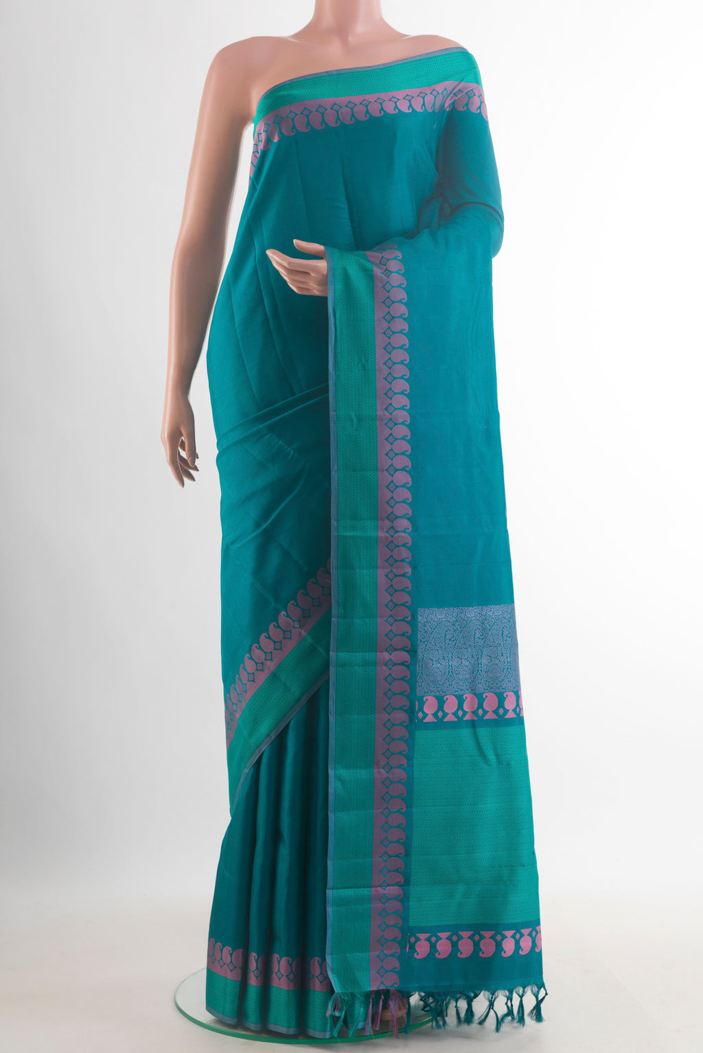 Pure Silk Peacock Blue Kanchipuram Saree with Plain Body and Thread Border.  displayed on a mannequin