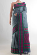 Pure Silk Grey Kanchipuram Saree with Thread Butta on the body and Thread Border.  displayed on a mannequin