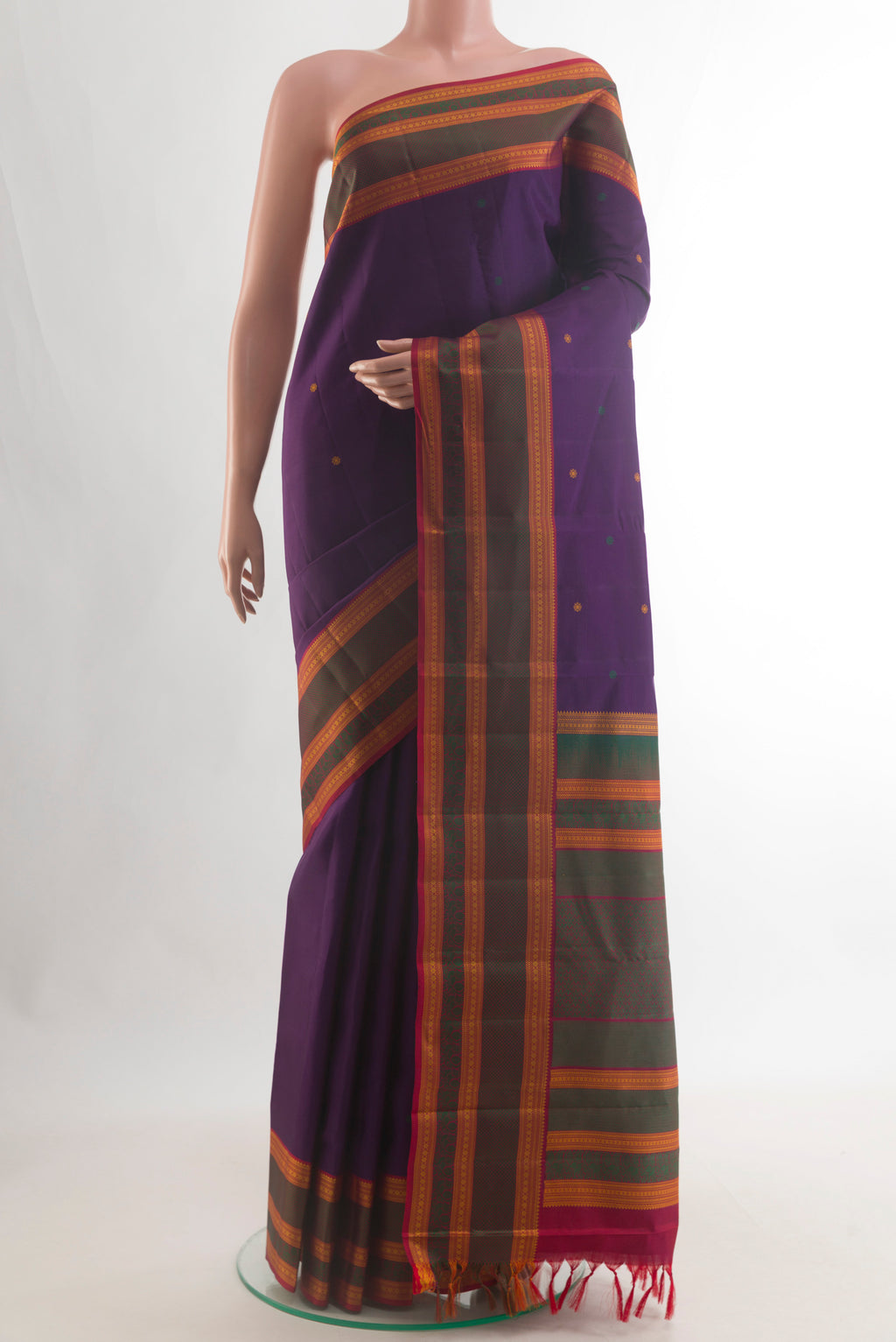 Pure Silk Purple Kanchipuram Saree with Thread Butta on the body and Thread Border.  displayed on a mannequin