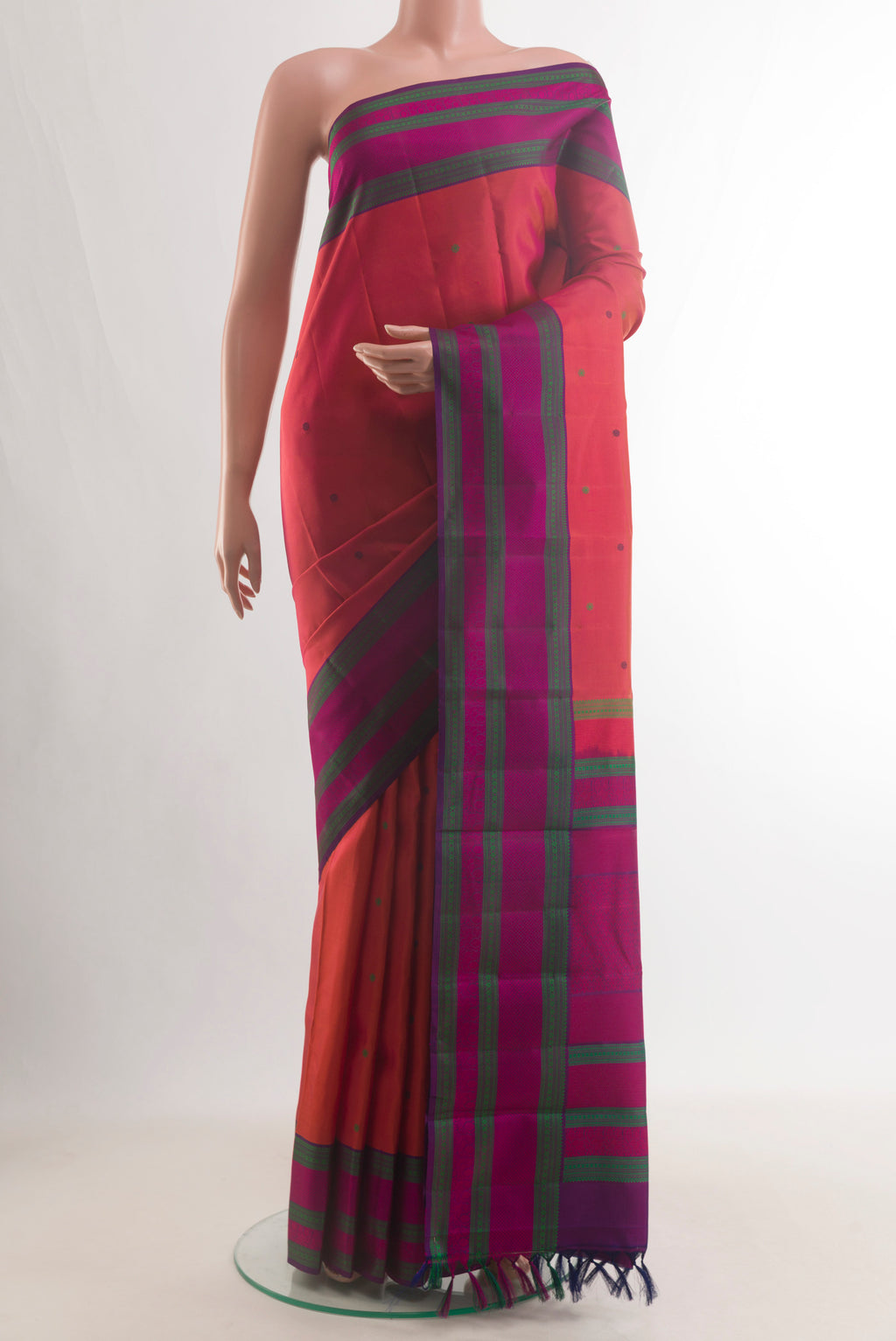 Pure Silk Red Kanchipuram Saree with Thread Butta on the body and Thread Border.  displayed on a mannequin