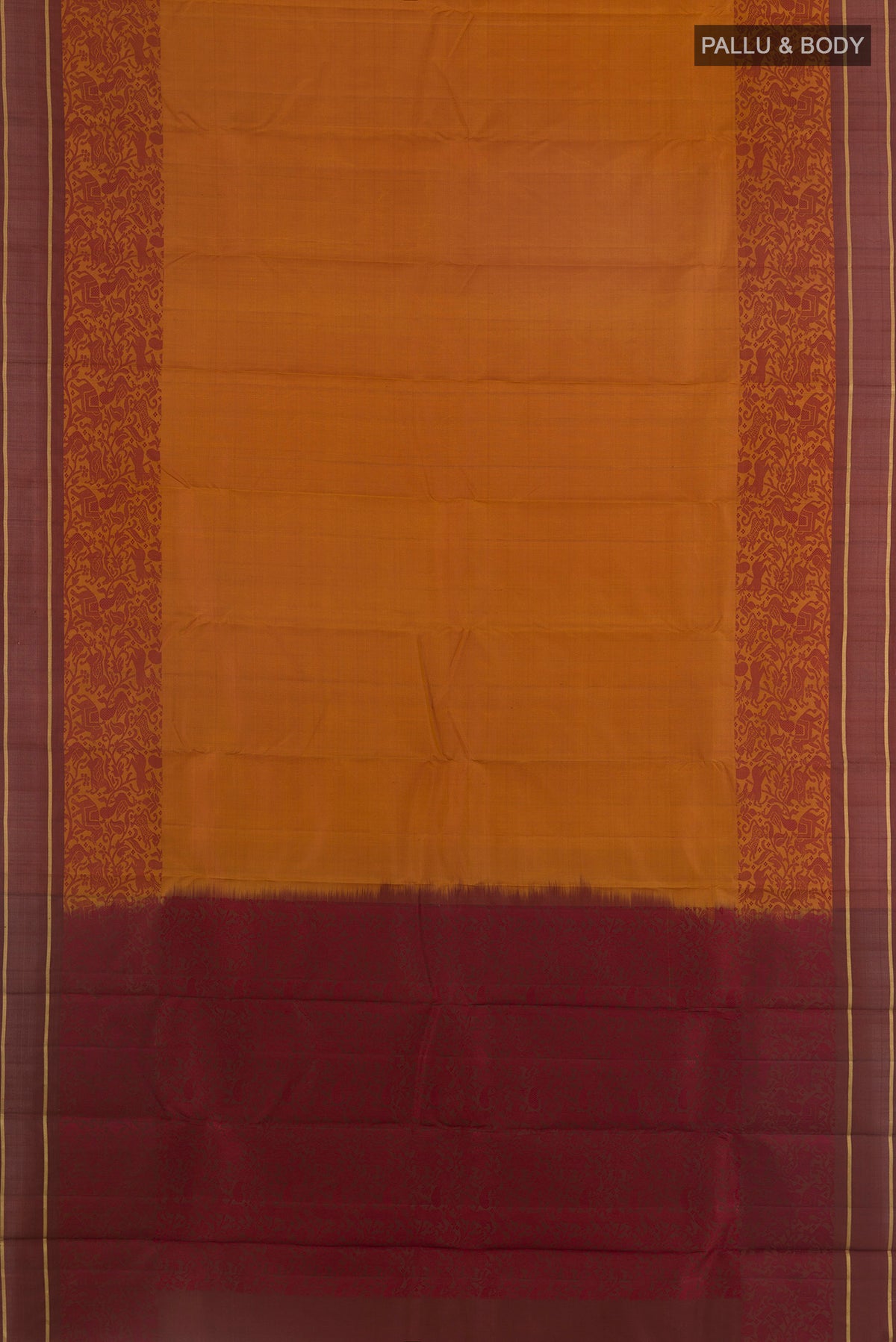 Flat view of Pure Silk Rust Kanchipuram Saree with Plain Body and Thread Border. 
